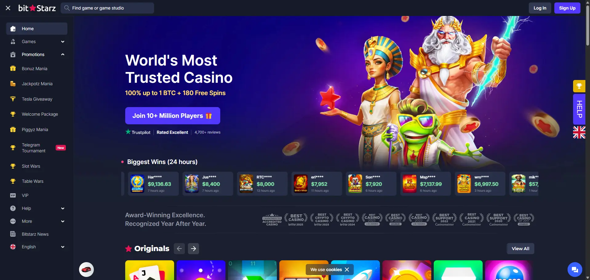BitStarz desktop homepage featuring the 100% up to 1 BTC plus 180 free spins welcome offer, recent player wins, casino awards and Originals games.