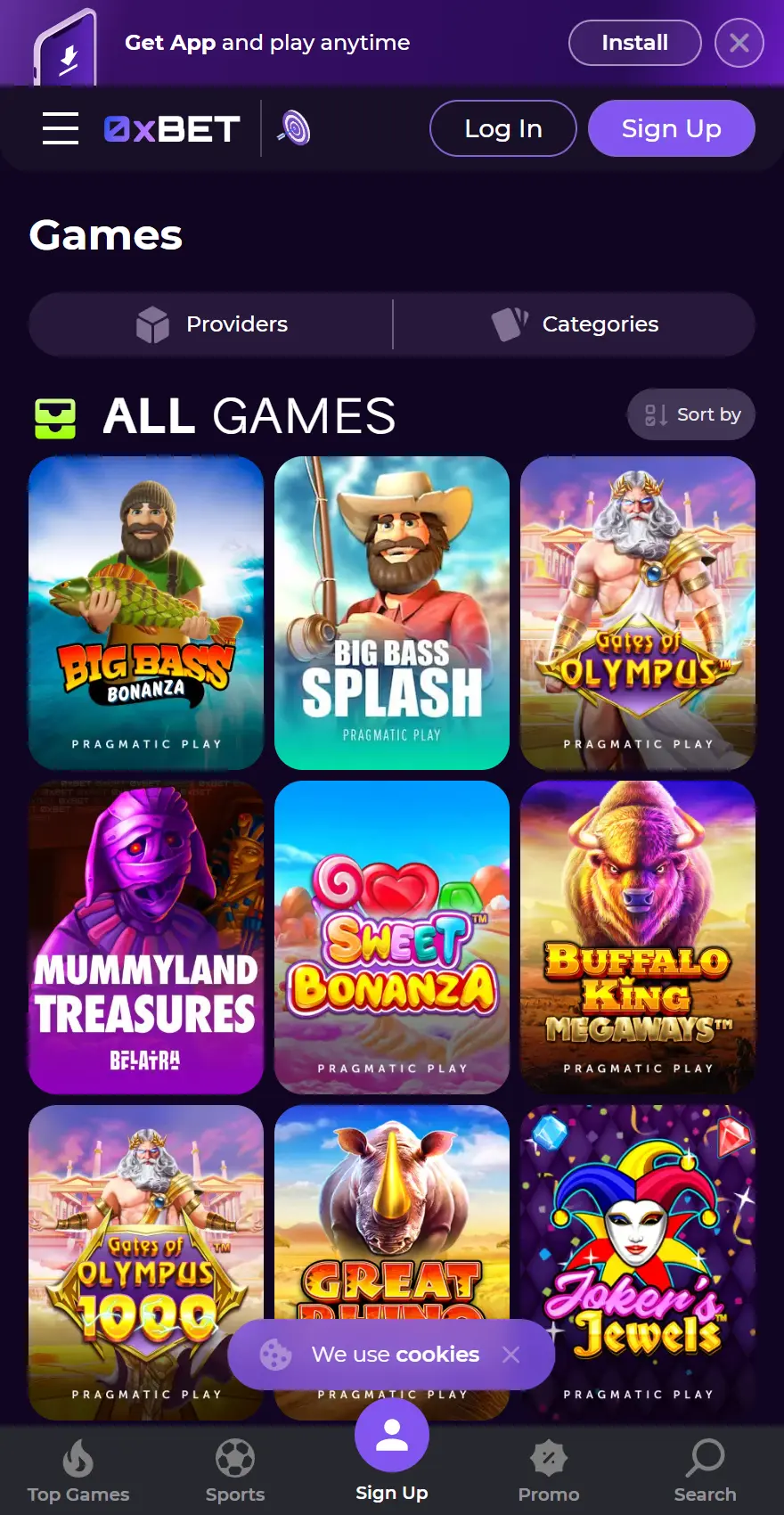 0xBet mobile all-games lobby with provider and category controls, showing Big Bass Bonanza, Big Bass Splash, Gates of Olympus, Mummyland Treasures, Sweet Bonanza, Buffalo King Megaways, Gates of Olympus 1000, Great Rhino Megaways and Joker’s Jewels, with bottom navigation for top games, sports, sign up, promotions and search.